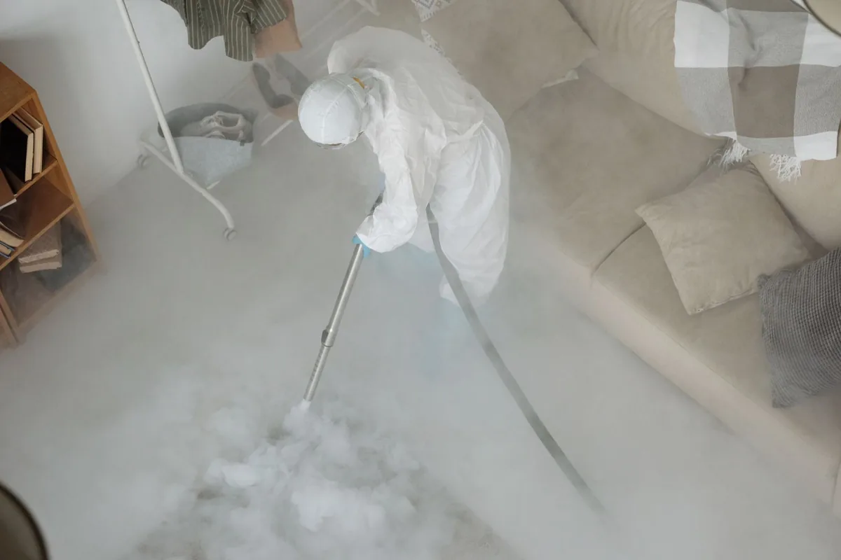 Biohazard cleanup technician in protective equipment, Oakhurst, Fort Worth, TX